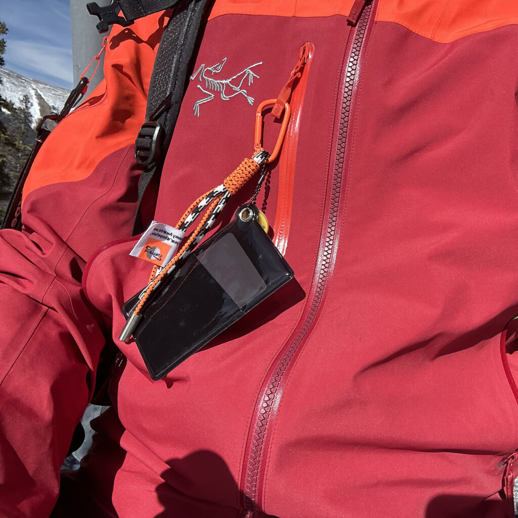 Asgard Ski Pass Holder with Expert Only label on red jacket