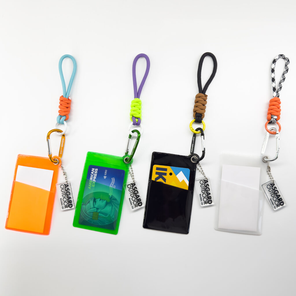 Set of multi-color ski pass holders with carabiners and smiley charms