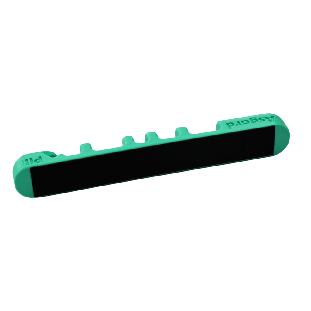 Back view of green Asgard Pill magnetic holder showing black magnetic contact strip on white background