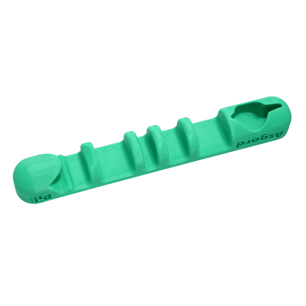 Green Asgard Pill magnetic ski and snowboard holder for car, angled product view on white background