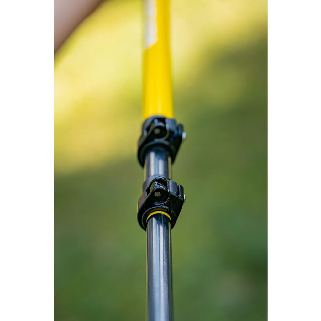 Close-up of Asgard Hydrogen Poles 2.0 lock system on yellow and carbon shaft