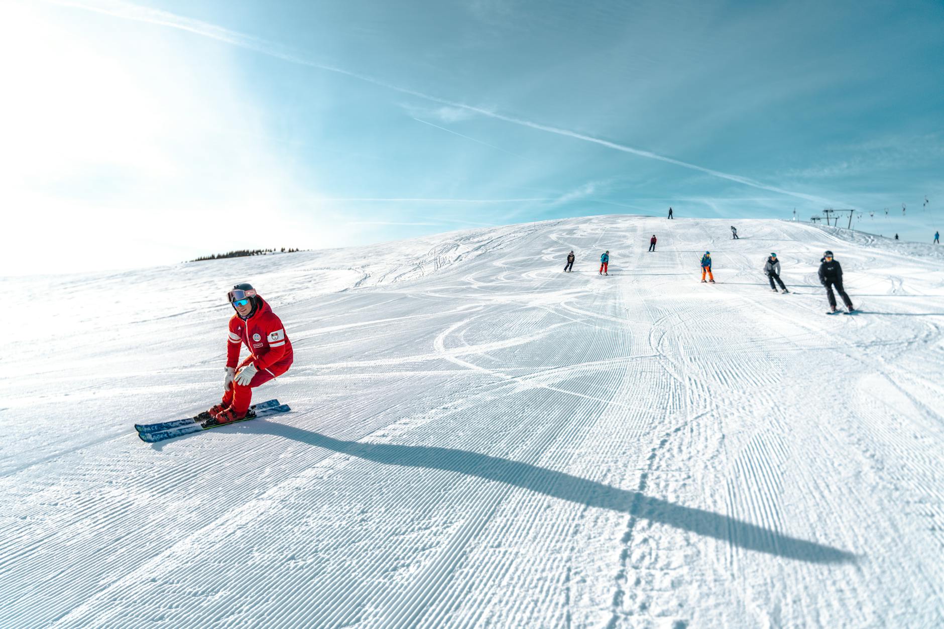 Aerial view of snowy ski resort with lifts and mountains-photo-by-pexels