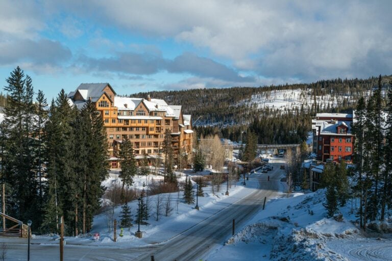Keystone Ski Resort village at dusk with skiers, lodges, and mountain views-photo-by-pexels
