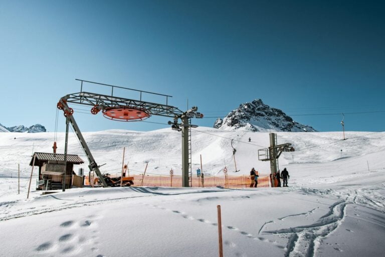 Family skiing together on gentle slopes at Montana ski areas, parents guiding kids on skis-photo-by-pexels