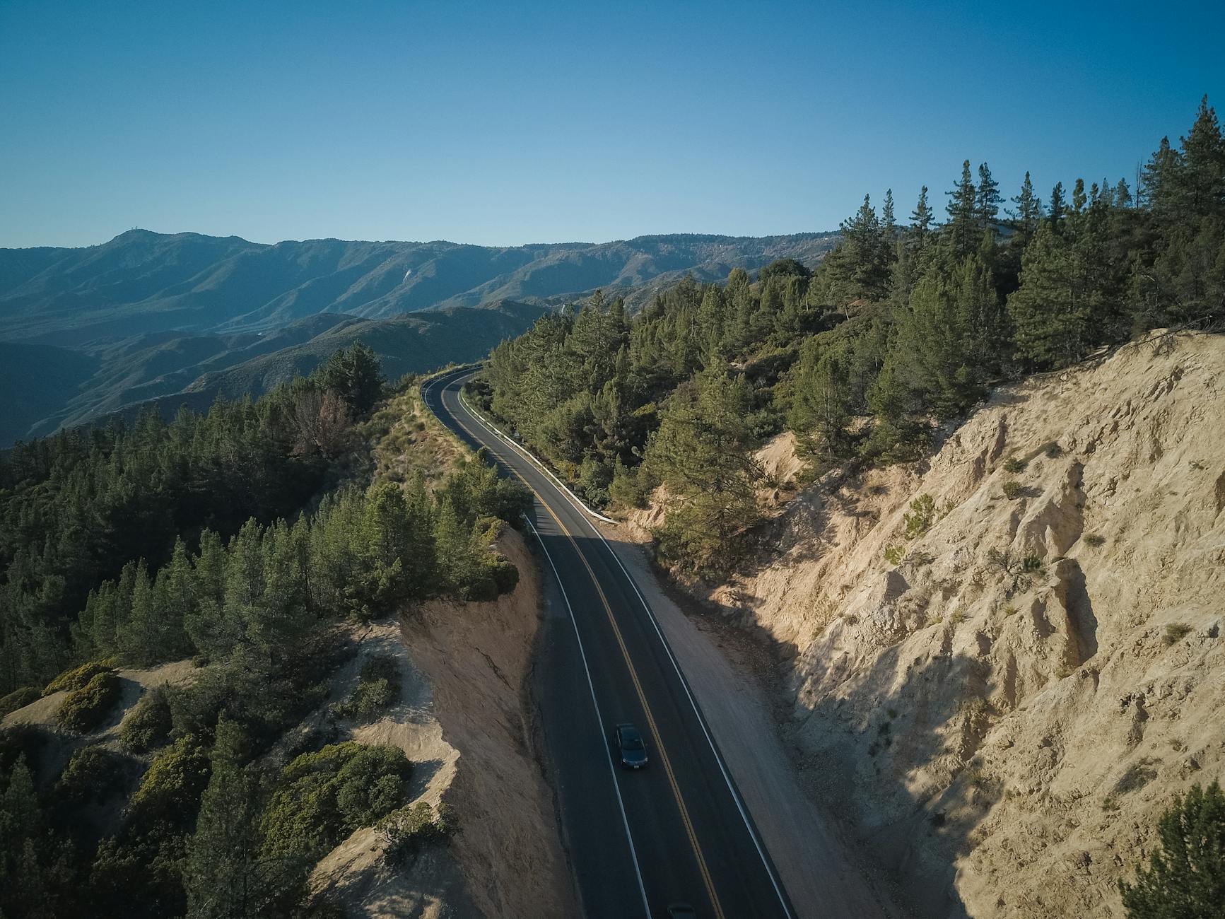 Winding snowy road on Highway 4 near Bear Valley-photo-by-pexels