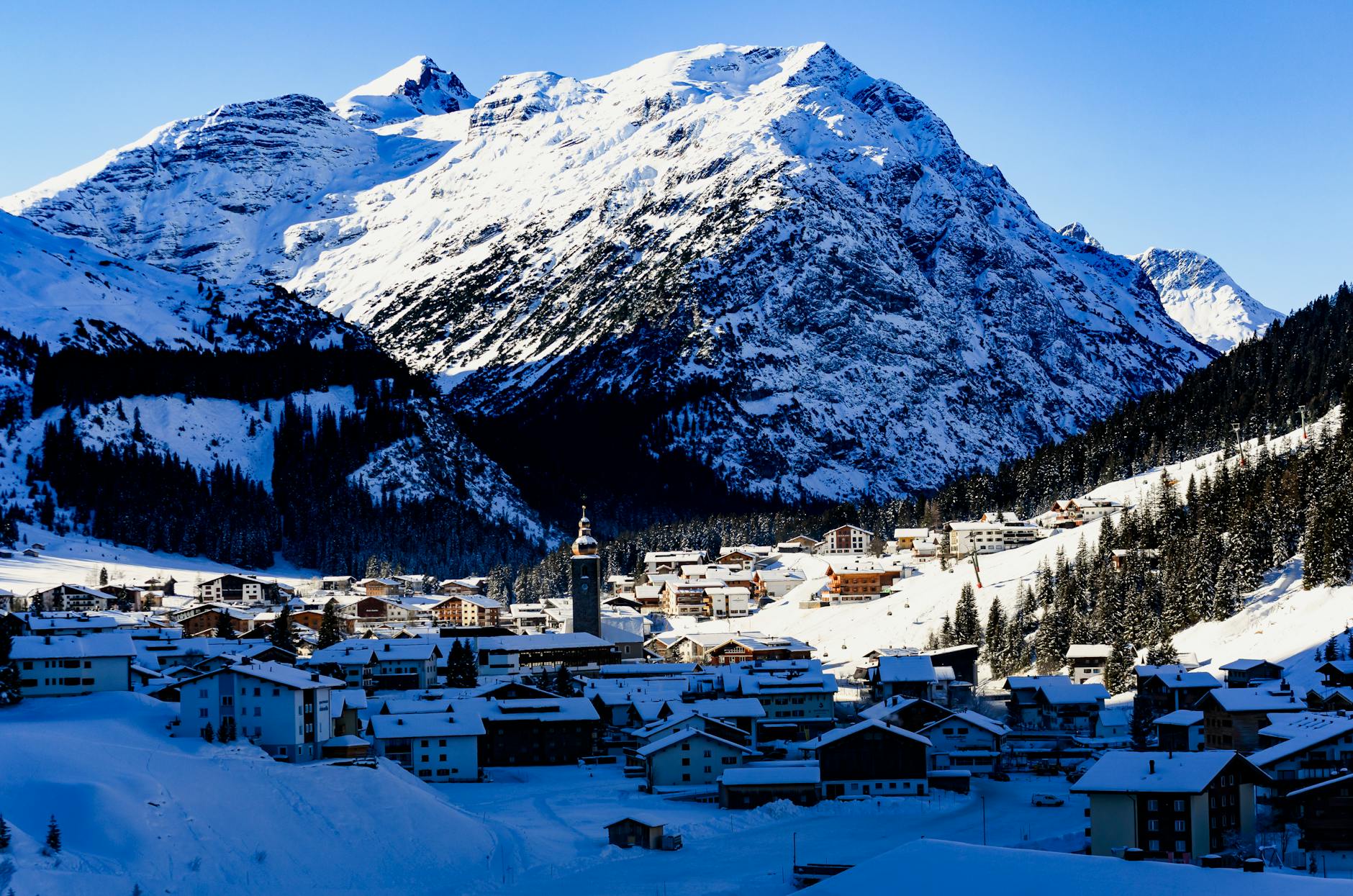 Snowy view of Schweitzer Village buildings and slopes-photo-by-pexels
