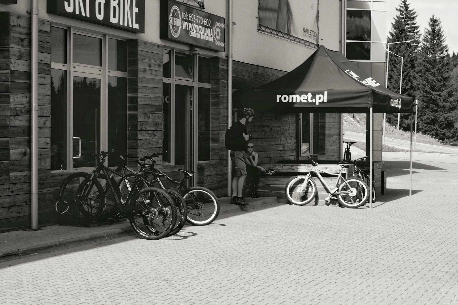 Rows of ski boots and skis in a rental shop-photo-by-pexels