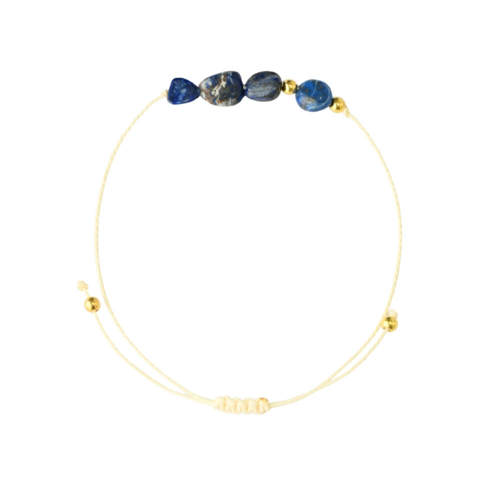 Asgard Abyss ID lapis mineral bracelet product photo with blue stone beads, gold-tone accents, and cream sliding cord.