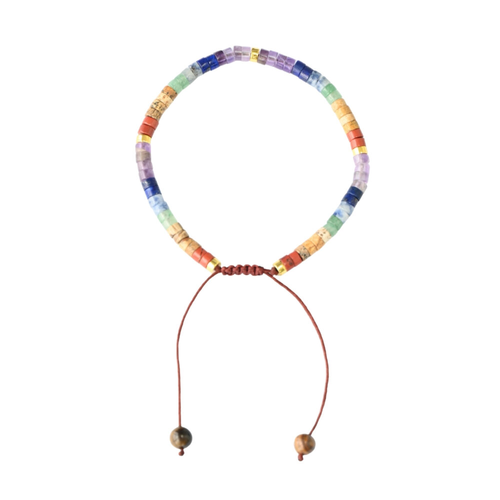 Asgard Strata ID layered natural stone bracelet with colorful disc beads and brown sliding cord on light background.