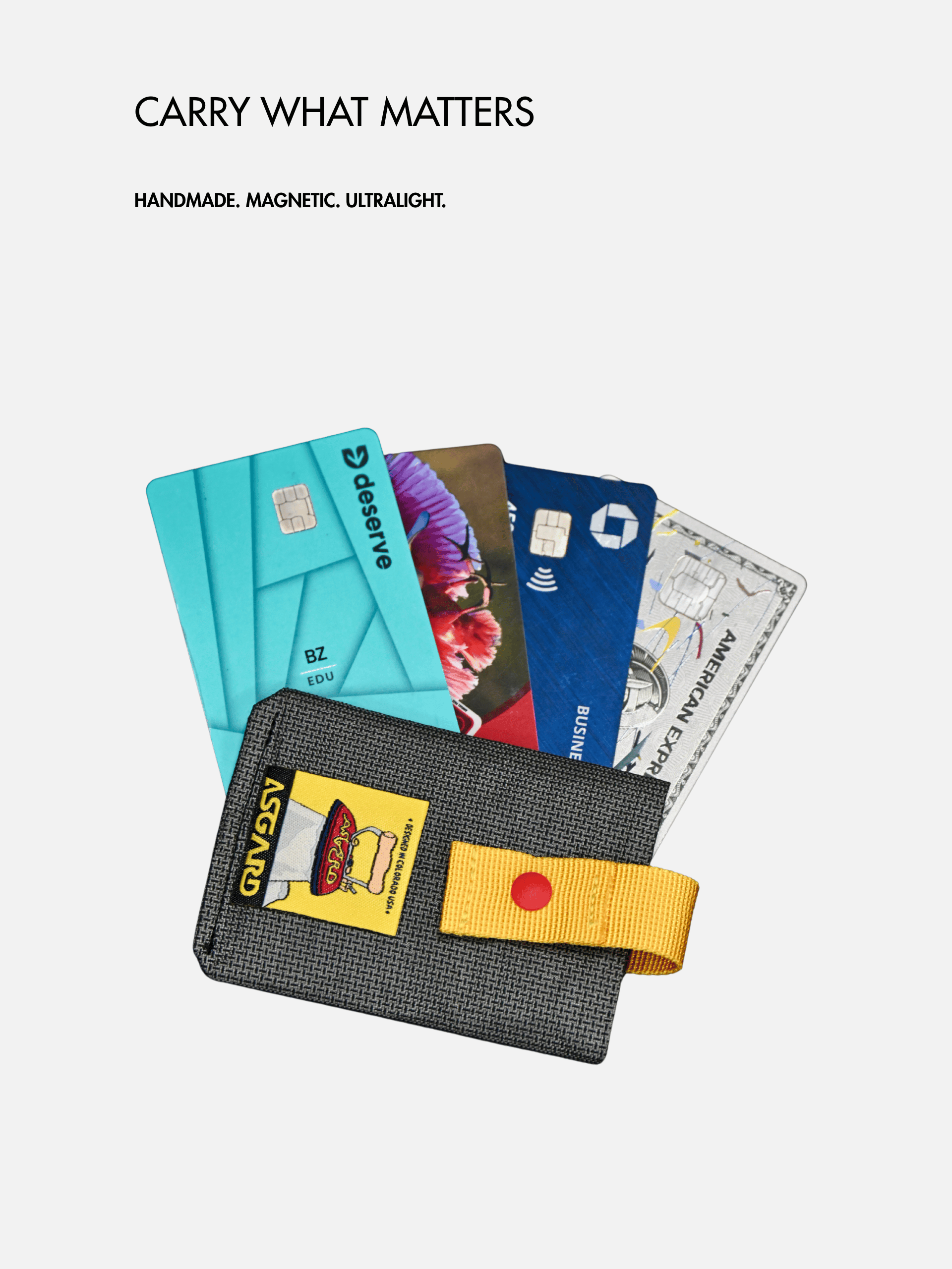 Several cards fanned out of an Asgard card holder beneath the “Carry what matters” headline.