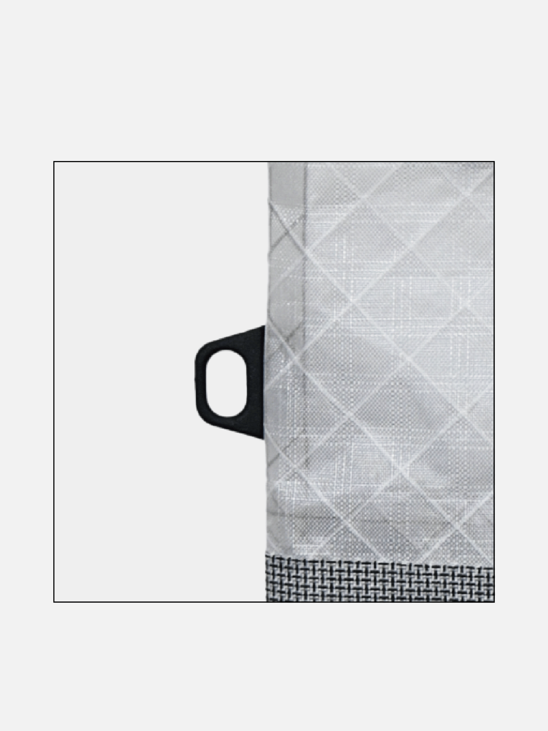 Black attachment loop extending from the side seam of the light gray Asgard mini tote.