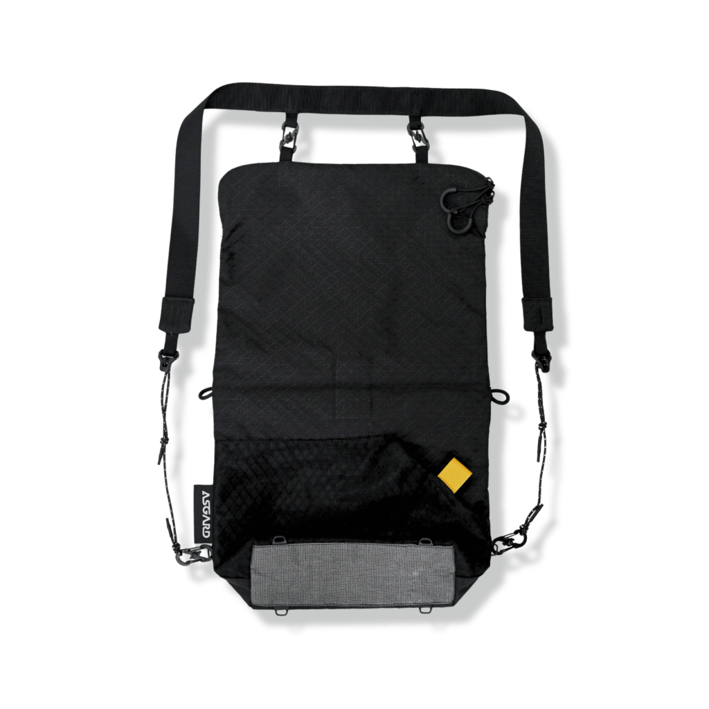Rear view of the Asgard Versa Bag 5L unfolded into backpack mode, showing its black panel, stretch pocket and strap connections.