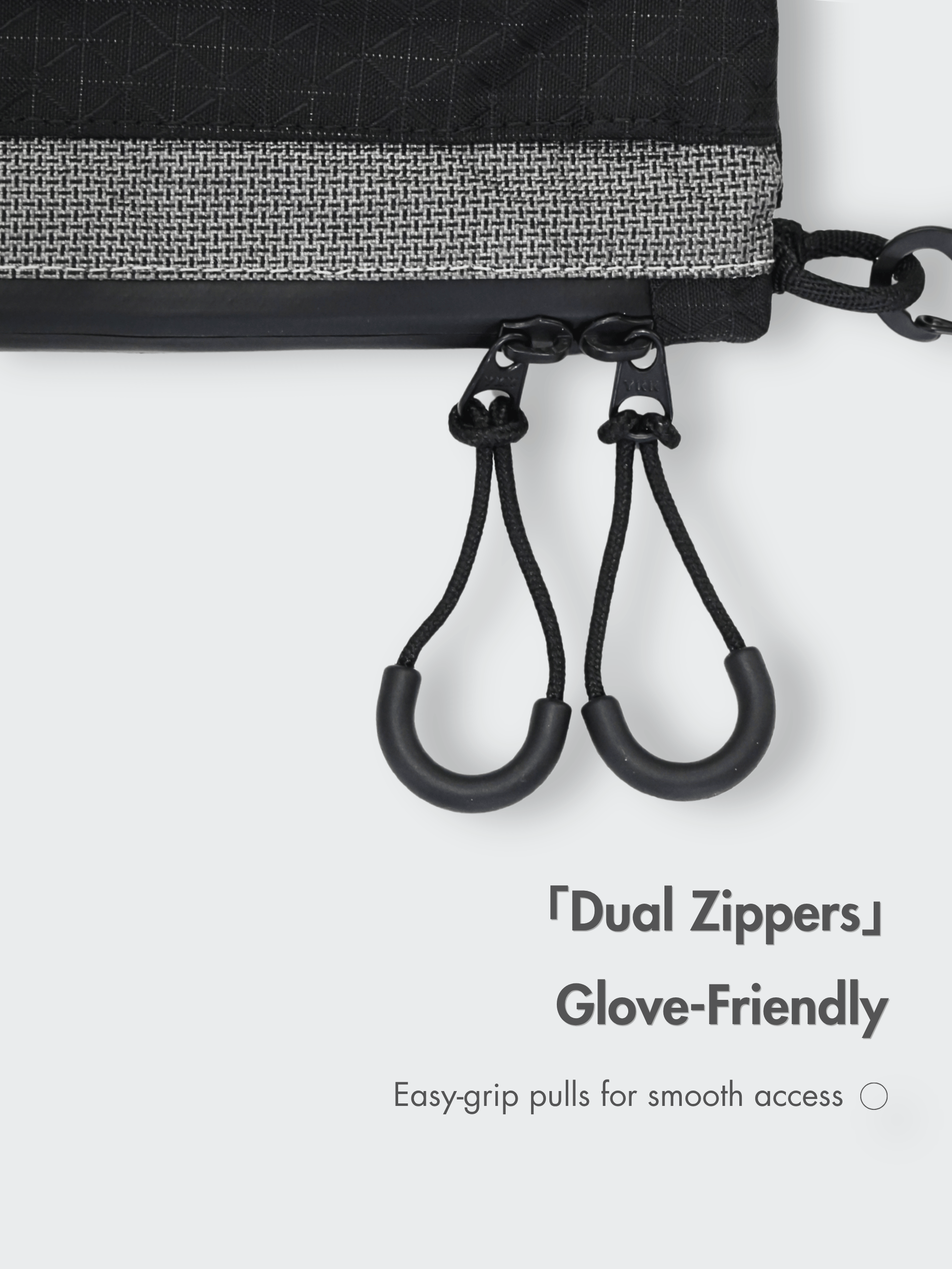 Close-up of the Asgard Versa Bag’s dual zipper pulls with large cord loops, designed for easy gripping with gloves.