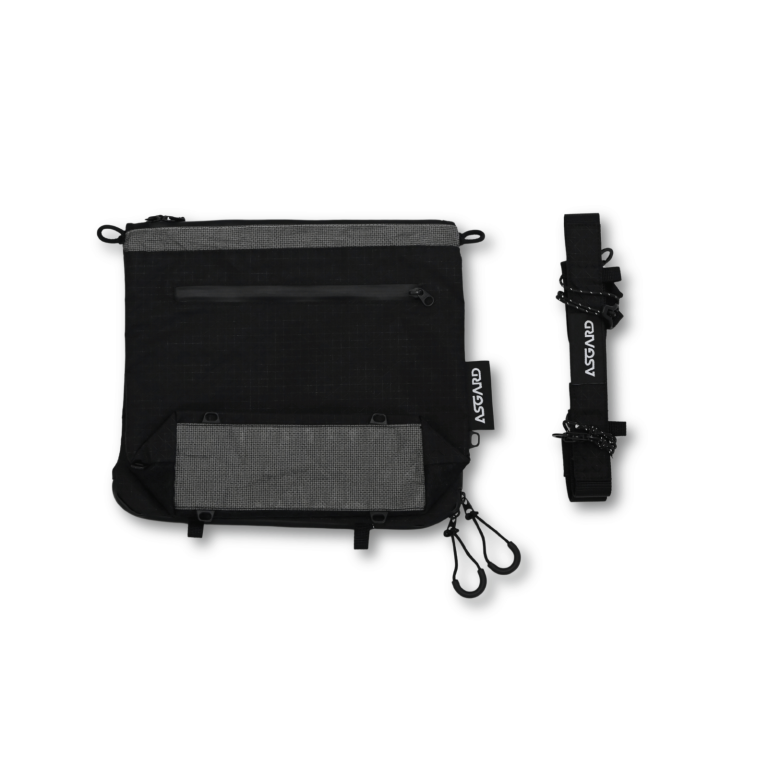 Rear of the Asgard Versa Bag 5L showing a black zippered pocket, gray reinforcement and a separate shoulder strap.