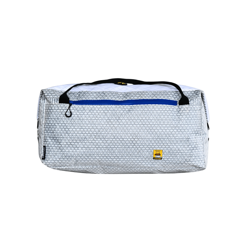 Front view of the silver-gray Asgard Duffel Bag with black carry handles and a blue front-pocket zipper.