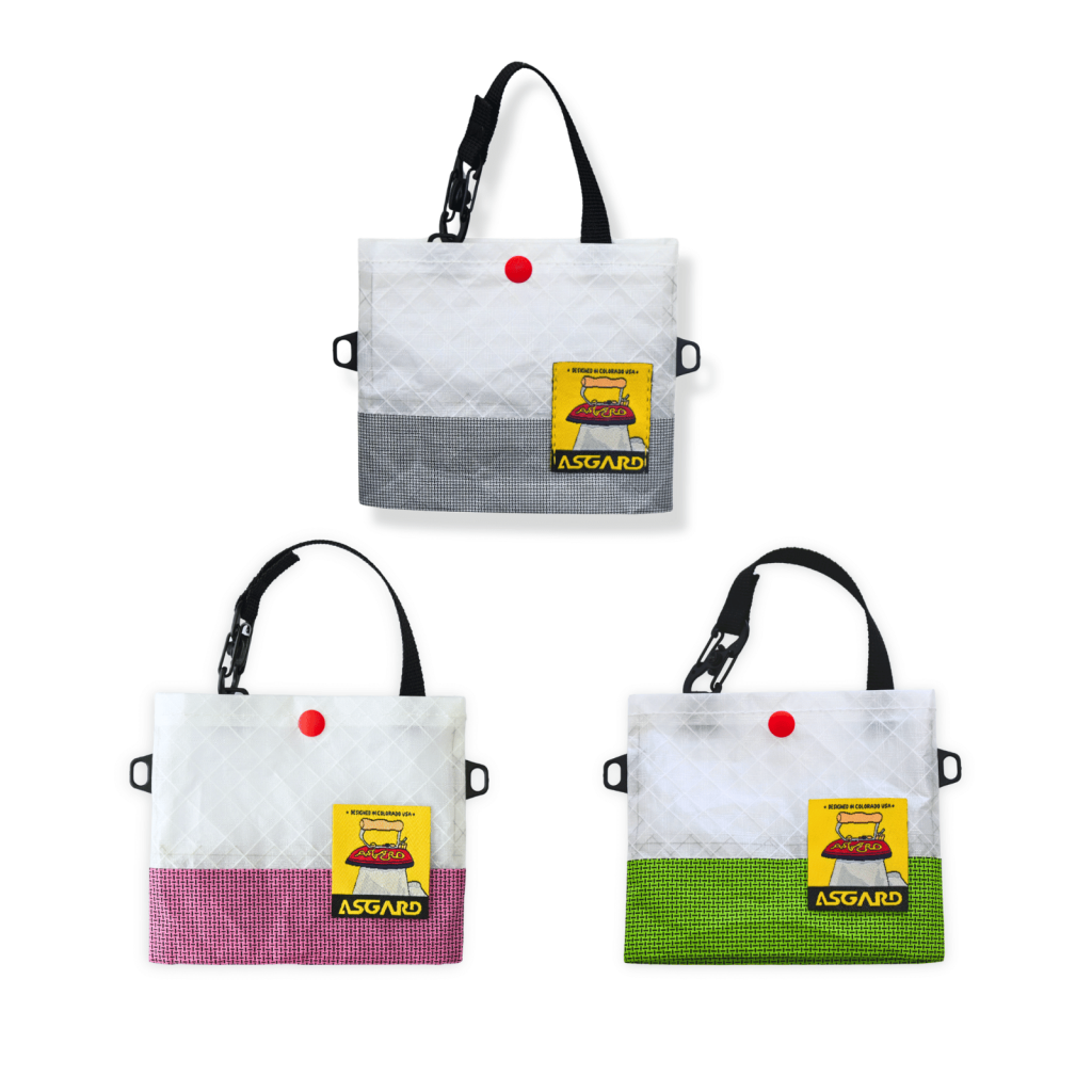 Gray, Pink, and Green Asgard Mini Tote Bags arranged together on a white background.